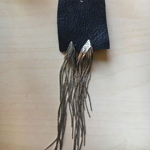 Silver dangling earrings from UrbanOutfitters